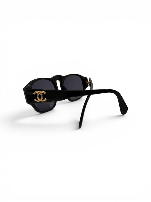 Curated Closet vintage black acetate Chanel sunglasses with gold CC logos and dark lenses. Model 01452.